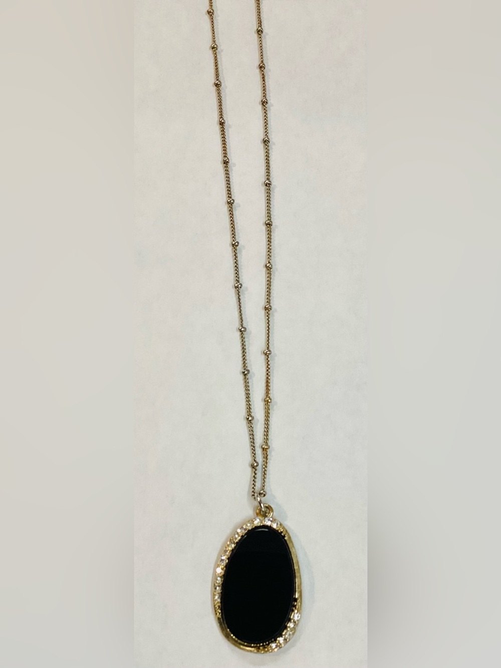 Mysterious Gold Pendant Necklace with Black Onyx Oval Charm 🌩️